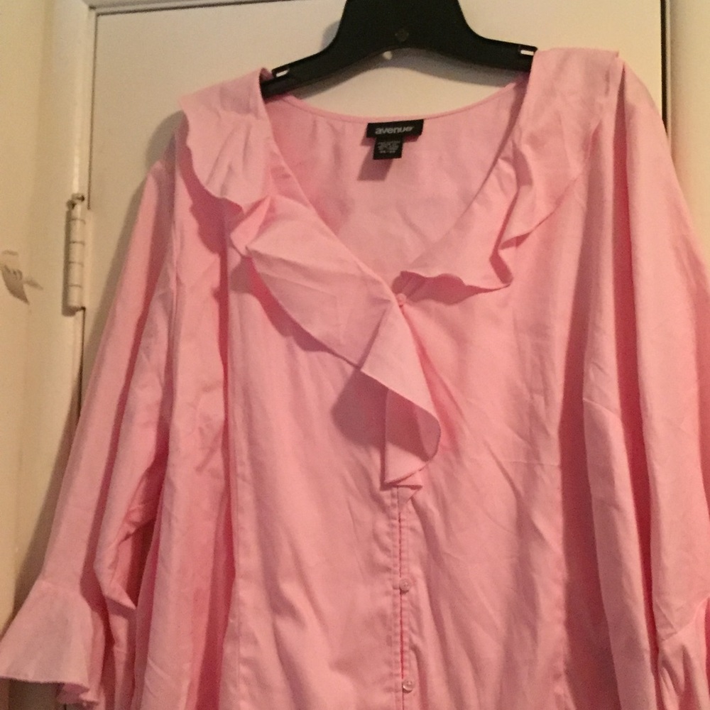 Cute spring colored pink blouse lots of frills